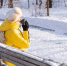 happy-young-woman-winter-warm-clothes-snowy-park-sunny-day-sits-benches-enjoys-fresh-air-coffee-alone - ТРК Щелково