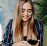 glamorous-woman-looking-phone-screen-while-sitting-office-indoor-shot-amazing-pretty-girl-resting-arm-chair - ТРК Щелково
